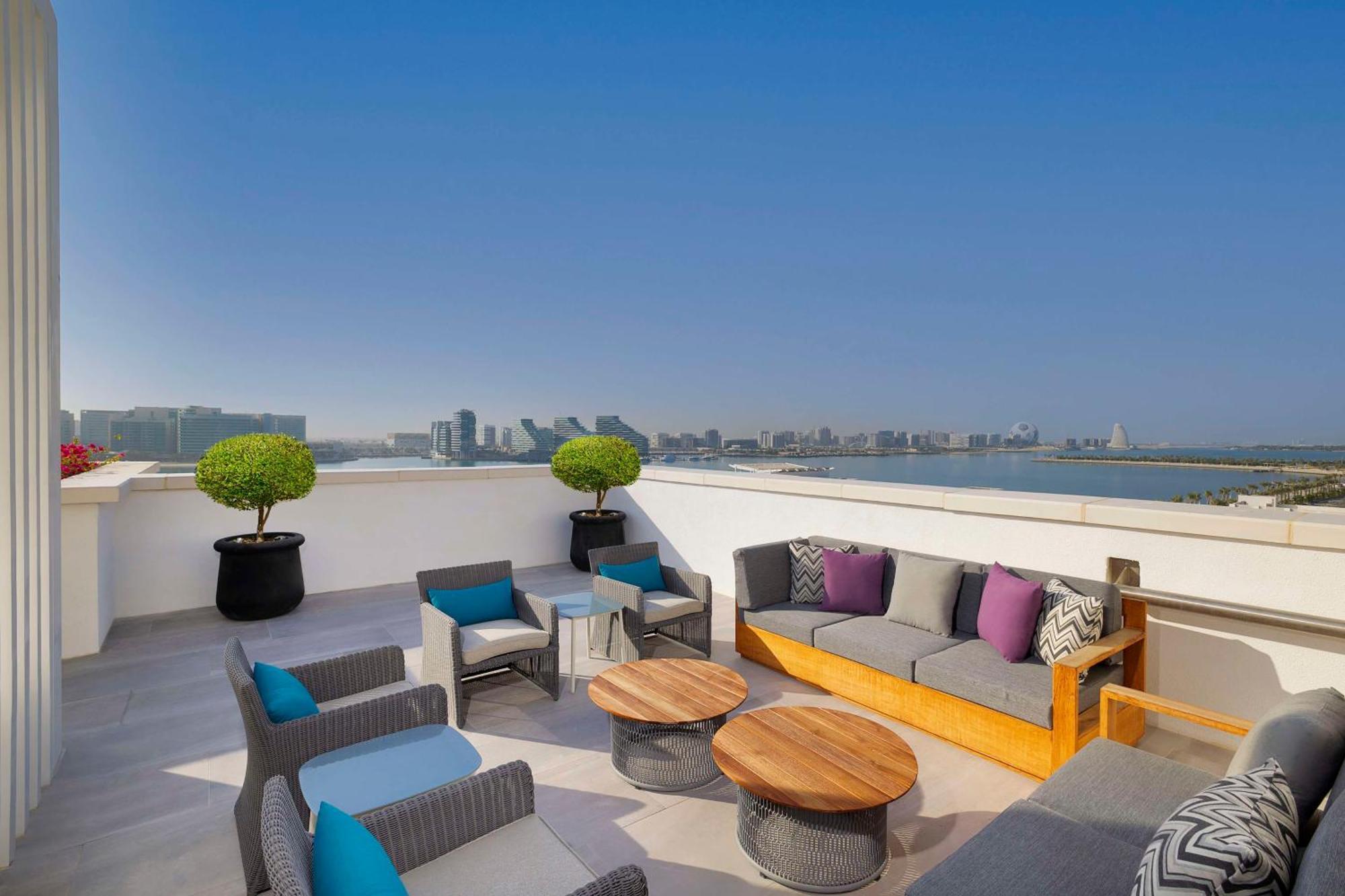 Hilton Abu Dhabi Yas Island Hotel Exterior photo Rooftop lounge at the Hotel Indigo